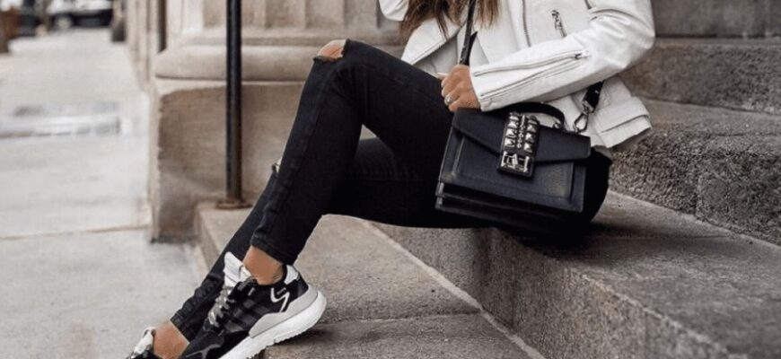 Як стильно поєднати чорні кросівки з різними елементами гардероба?